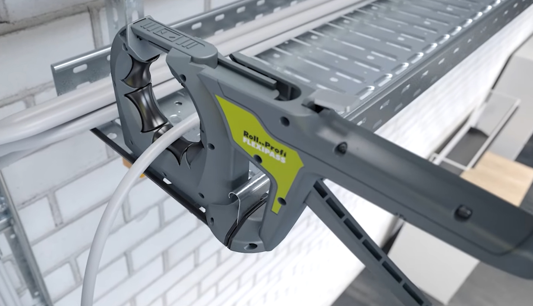 Rollprofi Flexipass is used to guide a cable through a cable trough showing the ease of use