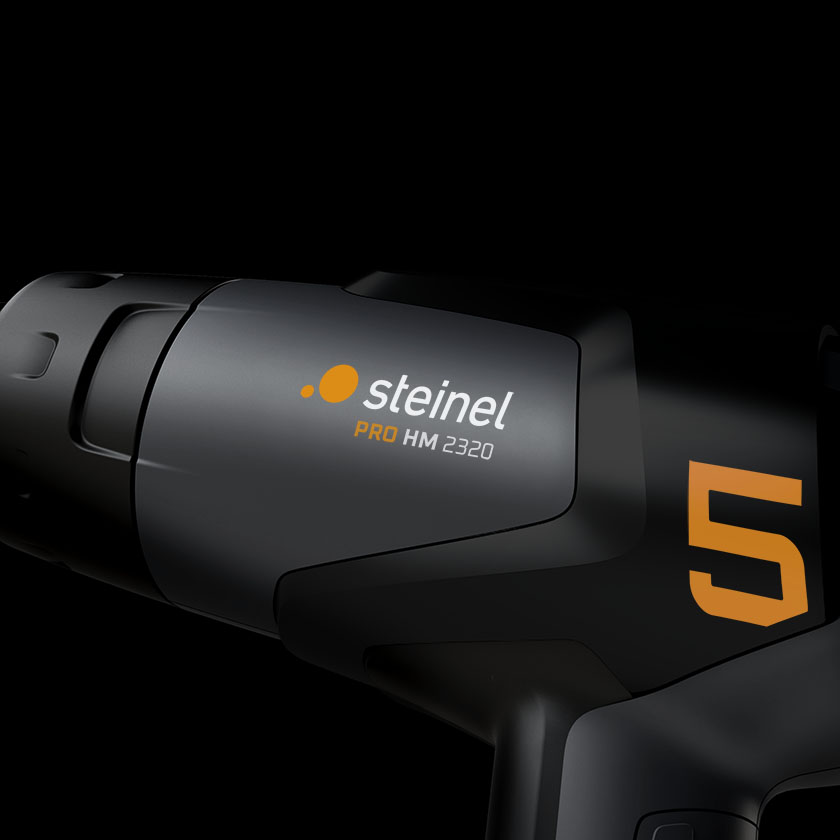 Moody shot of The C-Frame of the Steinel Pro HM 2320 hot air gun presenting the logo