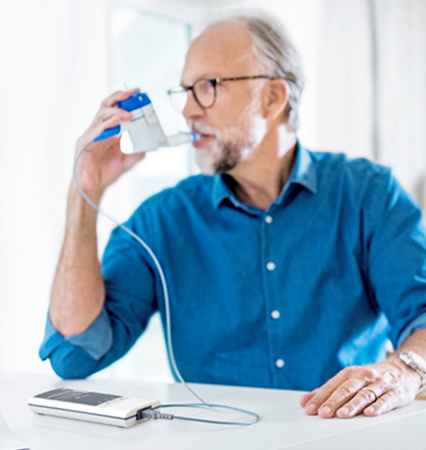 Patient using the Pari eFlow