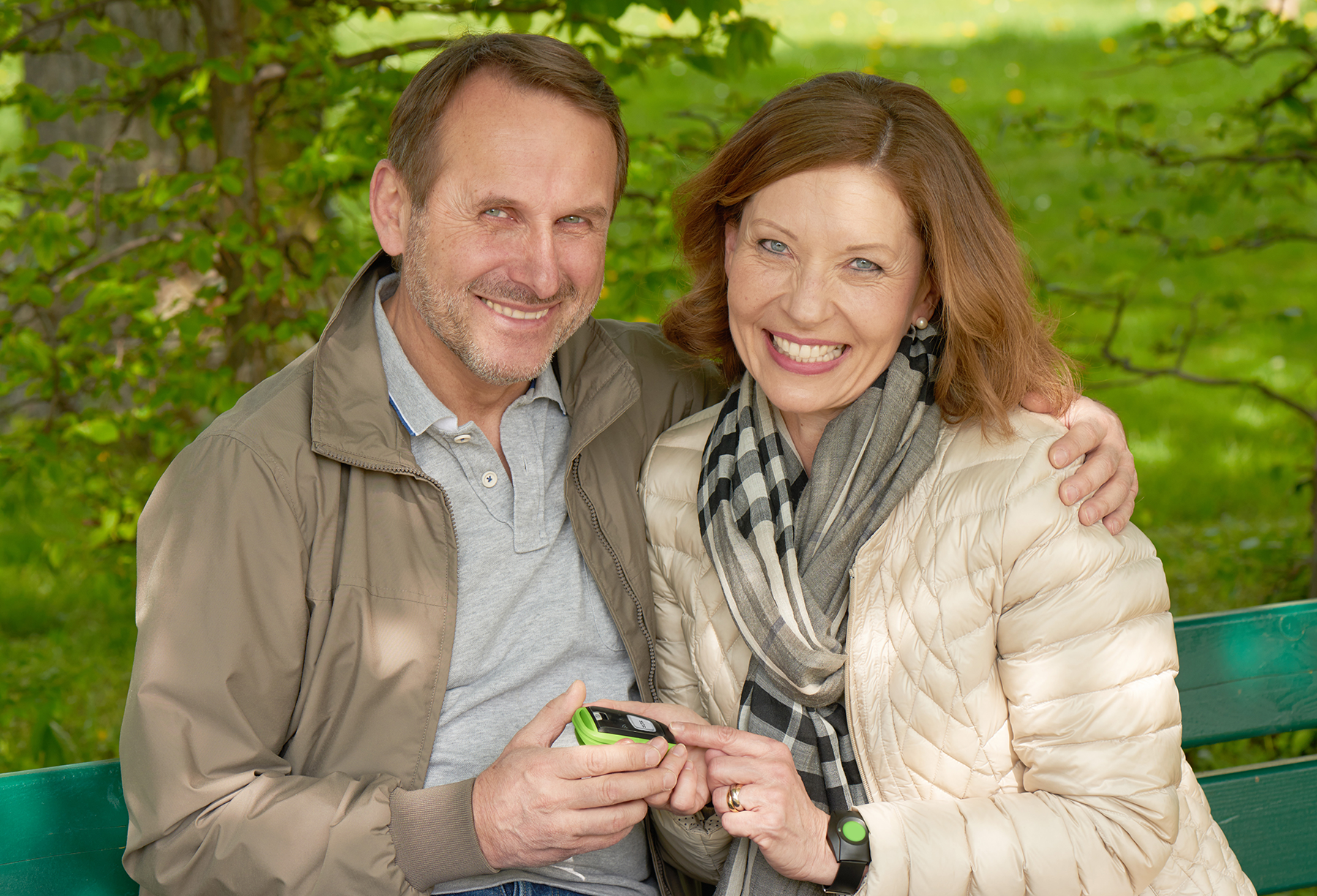 Two People holding the Libify mobile Emergency Call System